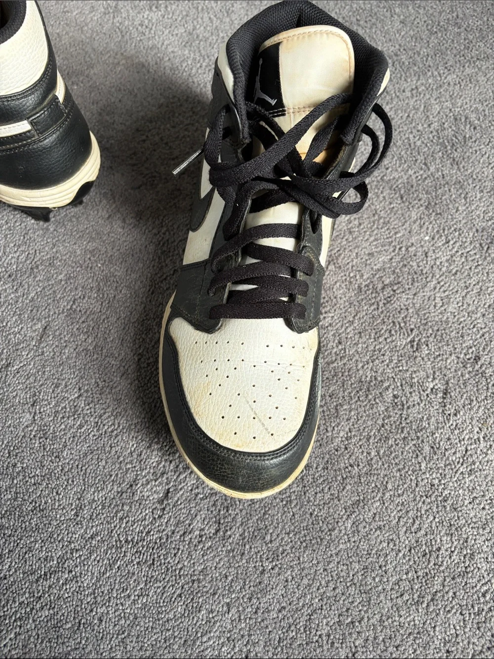 Nike Men’s Black and White High-Top Athletic Cleats